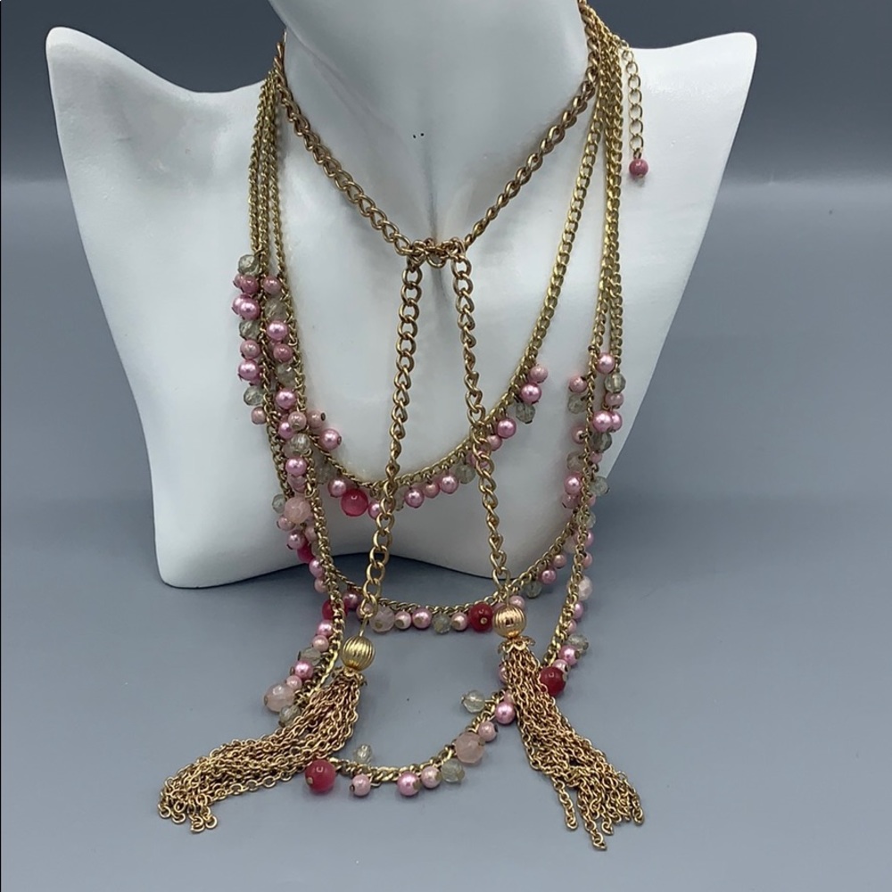 Two necklaces pink and gold.